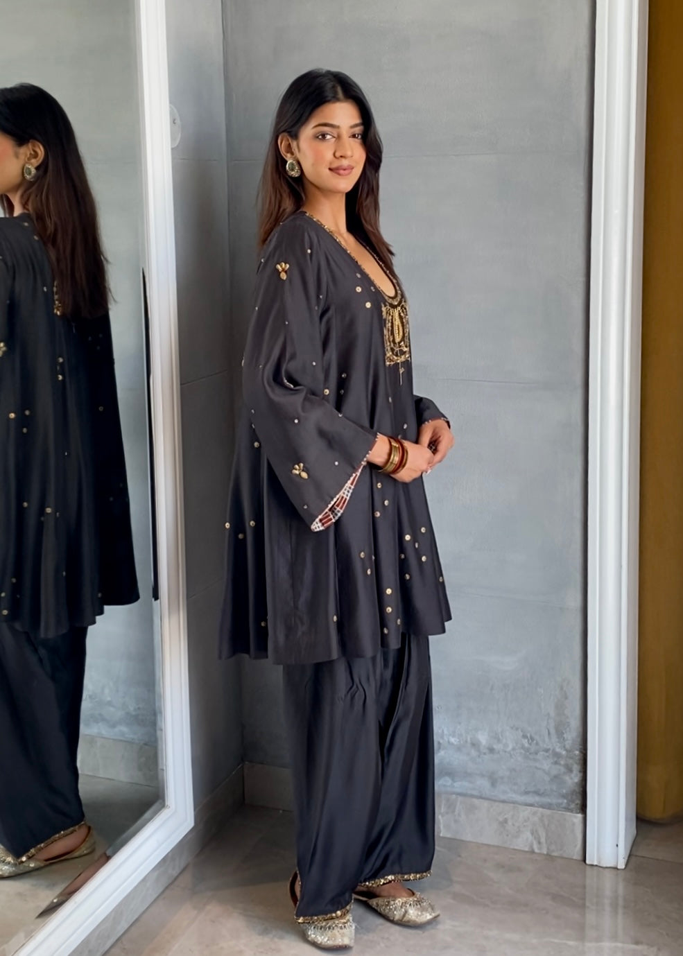 short anarkali paired with a farshi salwar and a dupatta