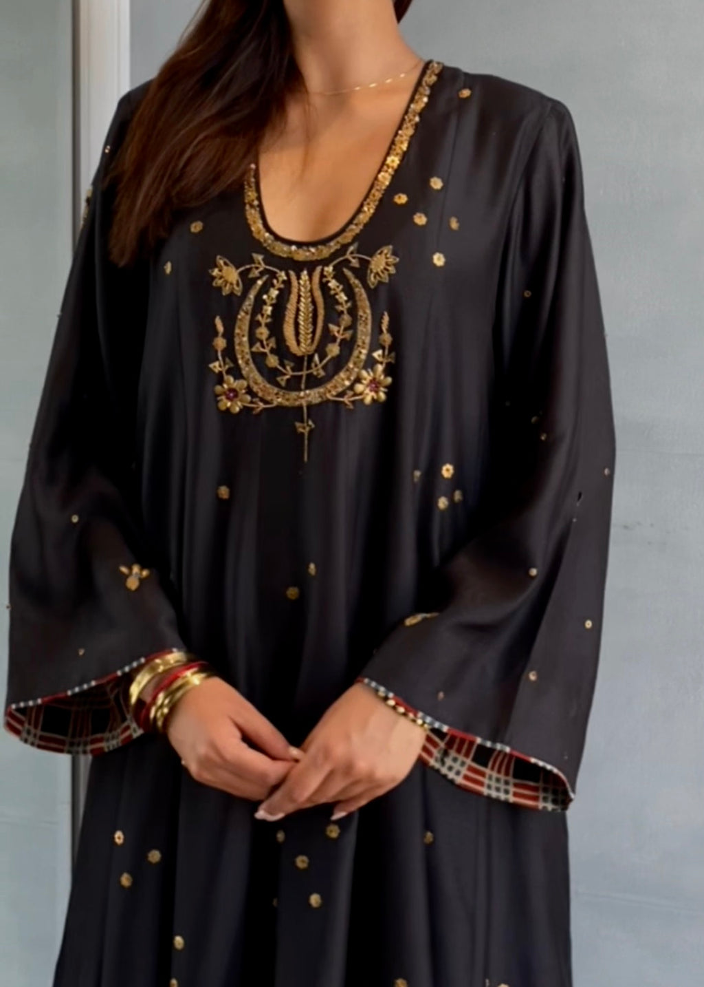 short anarkali paired with a farshi salwar and a dupatta